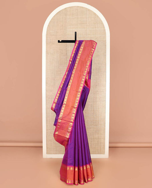 Purple Kanchipuram Silk Saree Beautified with Vazhaipoo Stripes, Complemented by Contrast Rettai Pettu Border of Thazampoo Rekku Designs, Zari Woven Pallu, and Paired with a Contrast Blouse