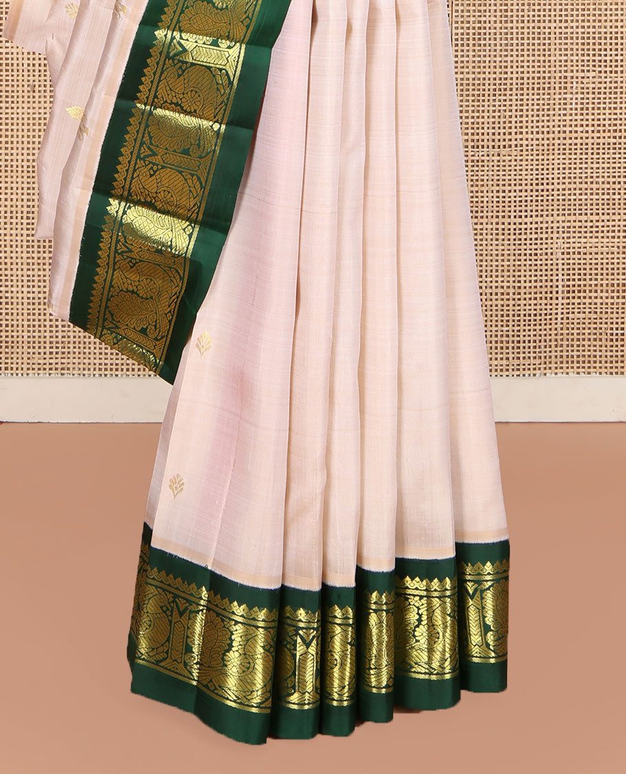 Off-White Kanchipuram Silk Saree, Embellished with Zari Buttas on Its Body, Complemented by a Contrast One-Sided Korvai Border of Salngai, Banaras, and Mayil Designs, Pallu of Floral Zari Designs, and Comes Without a Blouse