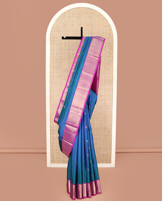 Blue Kanchipuram Silk Saree, Showcasing Zari Buttas All Over Its Body, Complemented by Contrast Border of Rekku, Neli, and Kodi Visiry Designs, Grand Jaal Pallu, and Paired with a Contrast Blouse