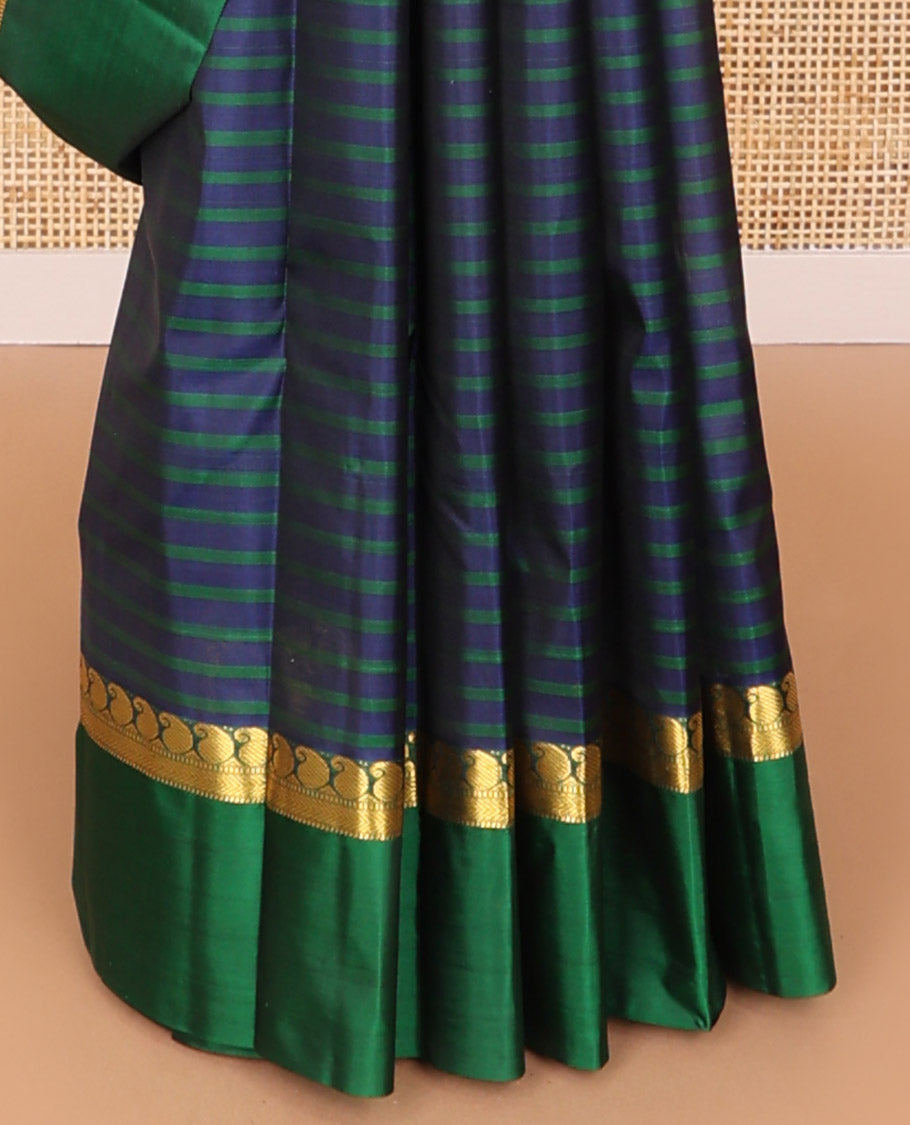 Blue striped kancheepuram silk saree with contrast ganga jamuna border of paisley, muthu, mayil design & zari design pallu