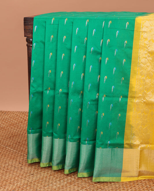 Green kuppadam cotton saree with buttas, plain design border & contrast pallu of intricate designs