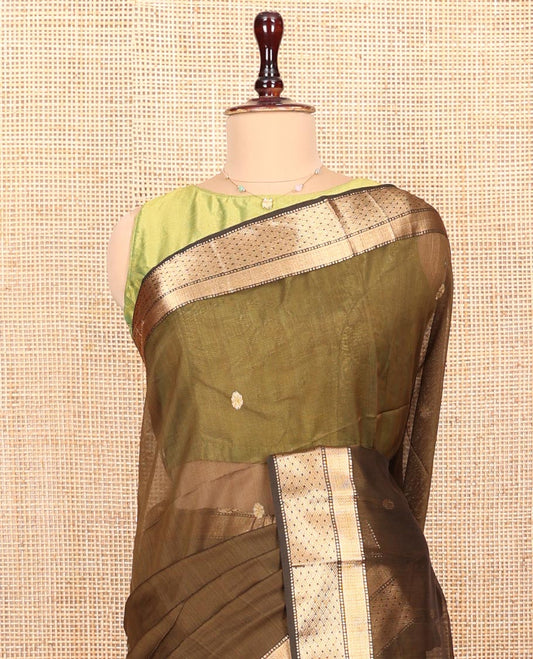 Green Maheshwari Cotton Saree, Decorated with Buttas All Over Its Body, Highlighted by a Zari Traditional Design Border, Pallu Steeped with Buttas, and Paired with a Matching Blouse