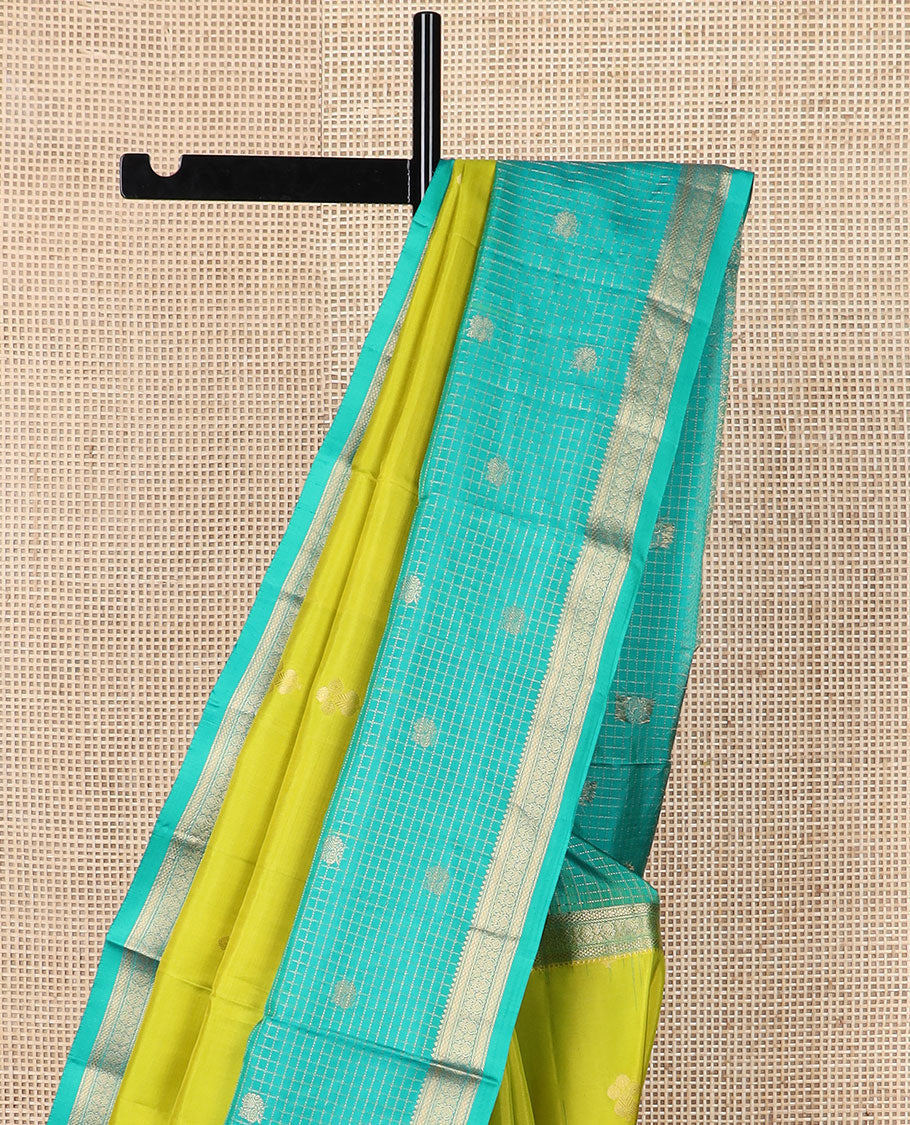 Parrot green zari buttas soft silk saree, contrast zari checked border of thilakam, banaras, mayil kann & mayil designs & geometric motifs enclosed checked pallu