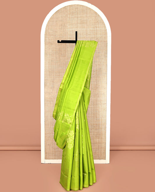 Borderless Green Mayuri Lite Silk Mix Saree, Charmingly Accented with Floral Zari Buttas All Over Its Body, Highlighted by a Pallu of Geometric Designs, and Paired with a Matching Blouse