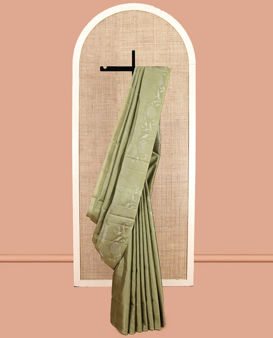 Green Mayuri Soft Silk Saree, Subtly Sparkled with Buttas, Subtle Floral Motif Border, Pallu of Floral Designs, and a Matching Blouse
