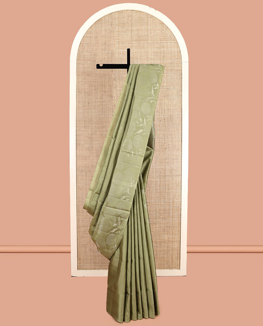 Green Mayuri Soft Silk Saree, Subtly Sparkled with Buttas, Subtle Floral Motif Border, Pallu of Floral Designs, and a Matching Blouse