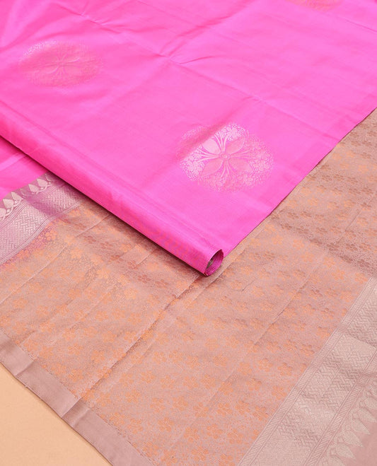 Borderless Candy Pink Mayuri Soft Silk Saree Decorated with Floral Buttas All Over Its Body, Complemented by a Contrast Pallu Picturing Copper Zari Floral Designs, and Paired with a Contrast Blouse