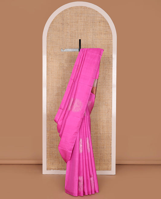 Borderless Candy Pink Mayuri Soft Silk Saree Decorated with Floral Buttas All Over Its Body, Complemented by a Contrast Pallu Picturing Copper Zari Floral Designs, and Paired with a Contrast Blouse