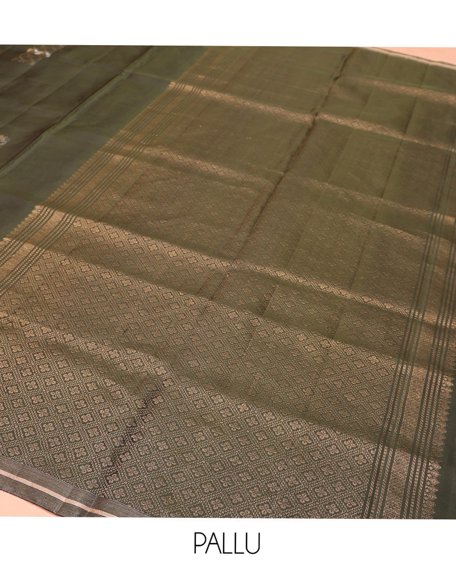 Green Mayuri Soft Silk Saree, Steeped in Richness with Paisley Buttas on Its Body, Subtle Zari Piping Border,  Pallu of Jaal Designs, and Paired with Matching Blouse