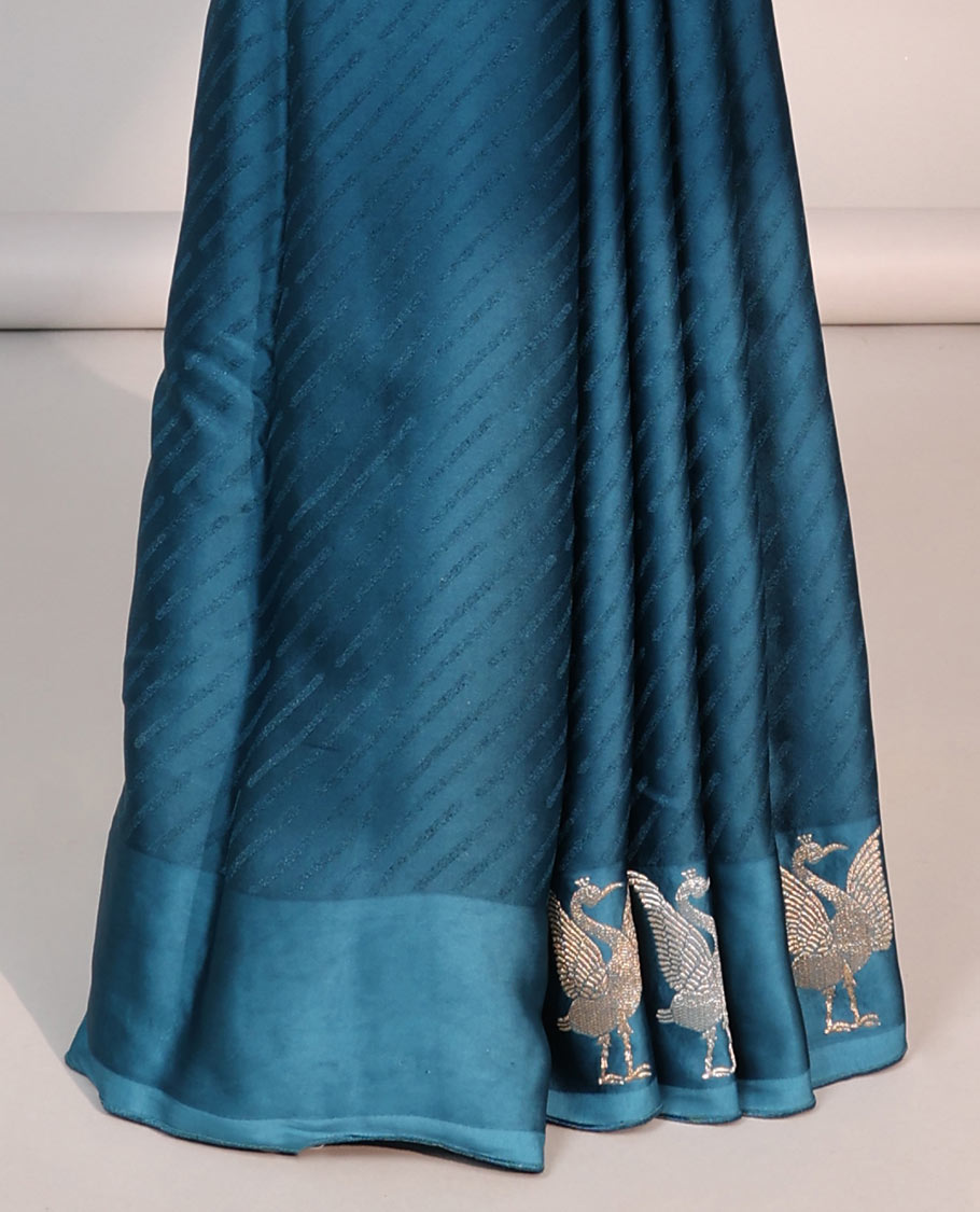 Blue striped mushru silk saree with animal motifs border & intricate jaal design pallu