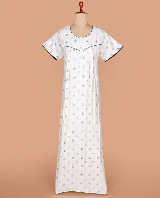 Cream floral and polka dots printed round necked half-sleeve nighty