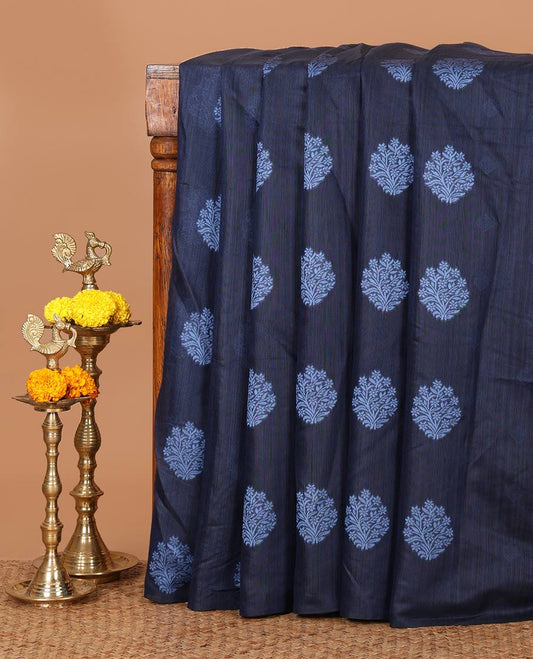 Borderless navy blue banaras jute silk saree with floral thread buttas woven all over it's body, intricate pallu & butta design blouse