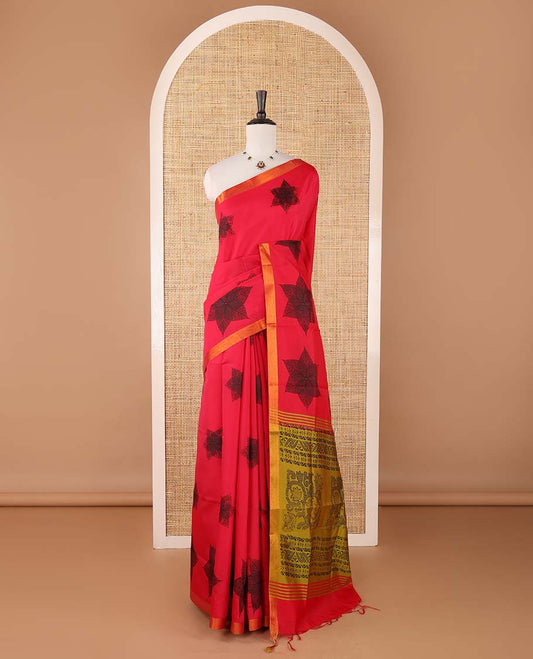 Red six-petal-like leaf motifs printed micro-silk saree, copper zari border, contrast intricate pallu & plain green blouse