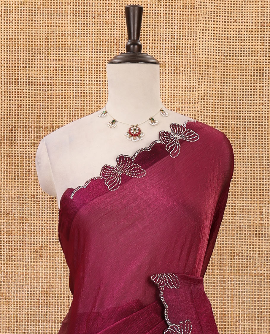 Wine full-plain Fendi chiffon saree, scallop butterfly-style Swarovski stone work border & stone work matching blouse