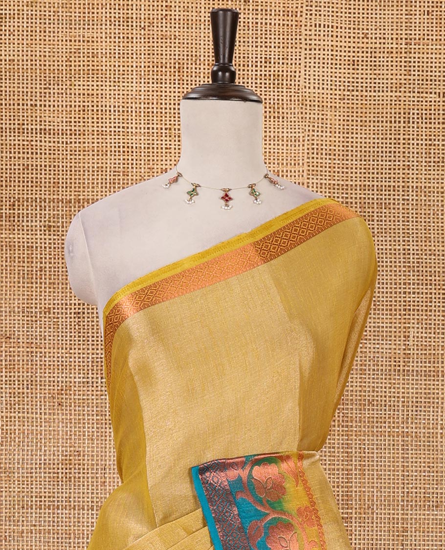 Gold plain tissue saree, contrast floral creeper & diamond patterned zari border, striped pallu & contrast plain blouse