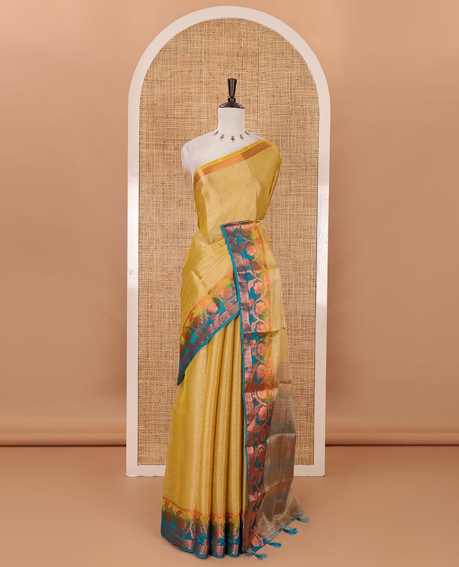 Gold plain tissue saree, contrast floral creeper & diamond patterned zari border, striped pallu & contrast plain blouse