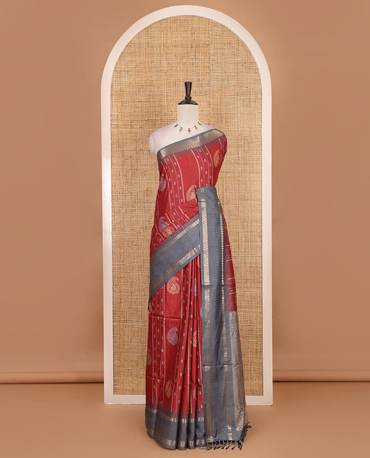 Maroon floral, manga and striped katan silk saree, contrast rettai pettu temple border of diamond and Greek key design, jaal pallu, and contrast printed blouse