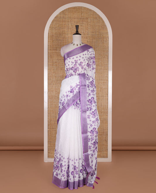 White lilac floral printed with Chikankari-style thread floral embroidered linen cotton saree, contrast zari bavanji border, and blouse of print and embroidery work