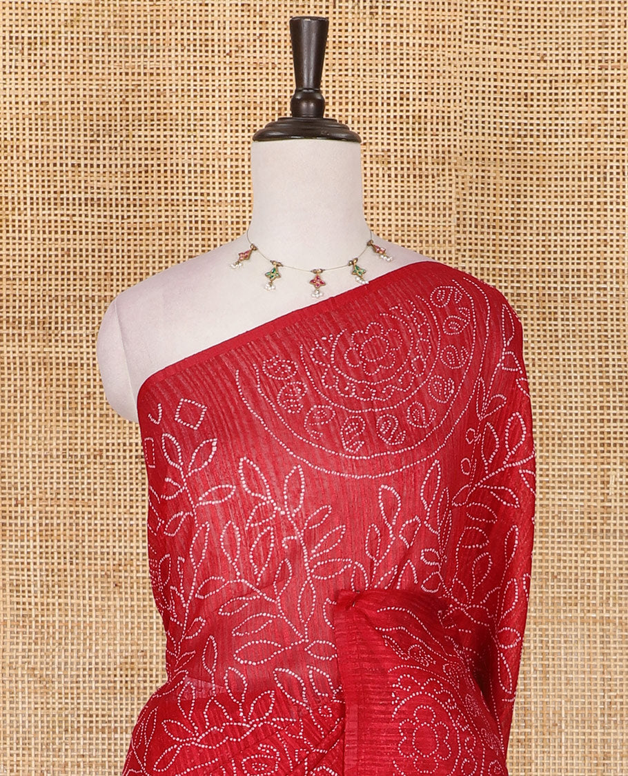 Borderless red bandhani style floral, paisley, and chakra printed semi-jute silk saree, contrast ajrakh printed pallu, and ajrakh printed blouse