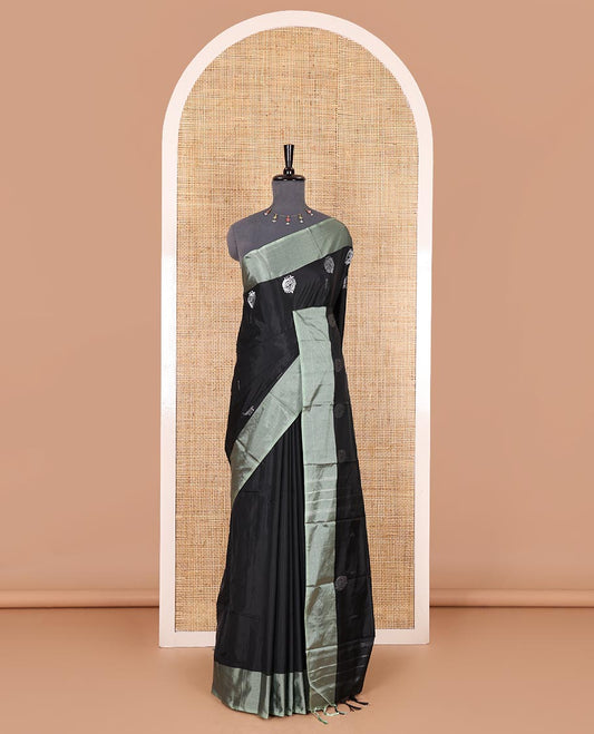 Black buttas and peacock buttas woven Kanchi silk saree, contrast satin zari striped border, zari design pallu, and a matching blouse