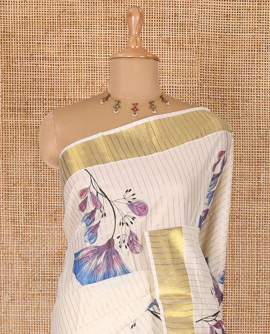 Cream and blue vertically striped with handblock floral motifs printed Kerala cotton saree, zari striped border, handblock floral printed pallu, and a matching blouse