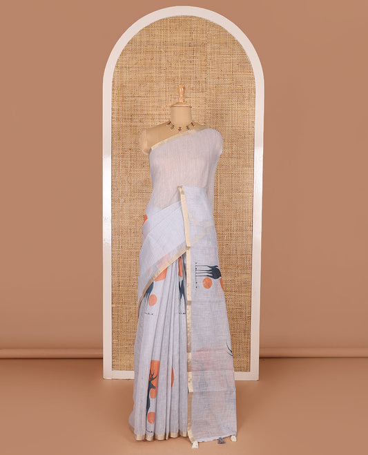 Grey sun and deer silhouette printed linen cotton saree, gold zari piping border, printed pallu, and a matching stripes printed blouse