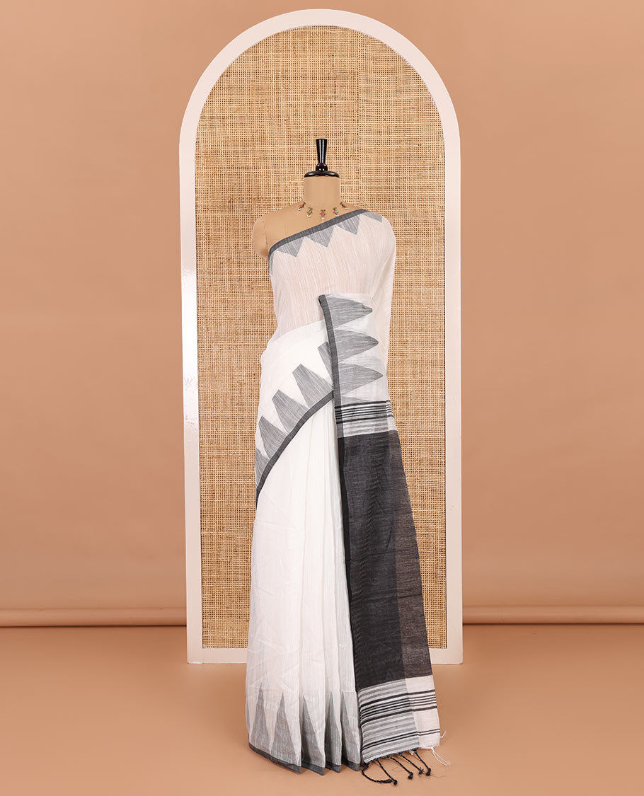 Half-white and grey plain khadi mul cotton saree, contrast thread temple border, plain pallu, and a contrast plain blouse