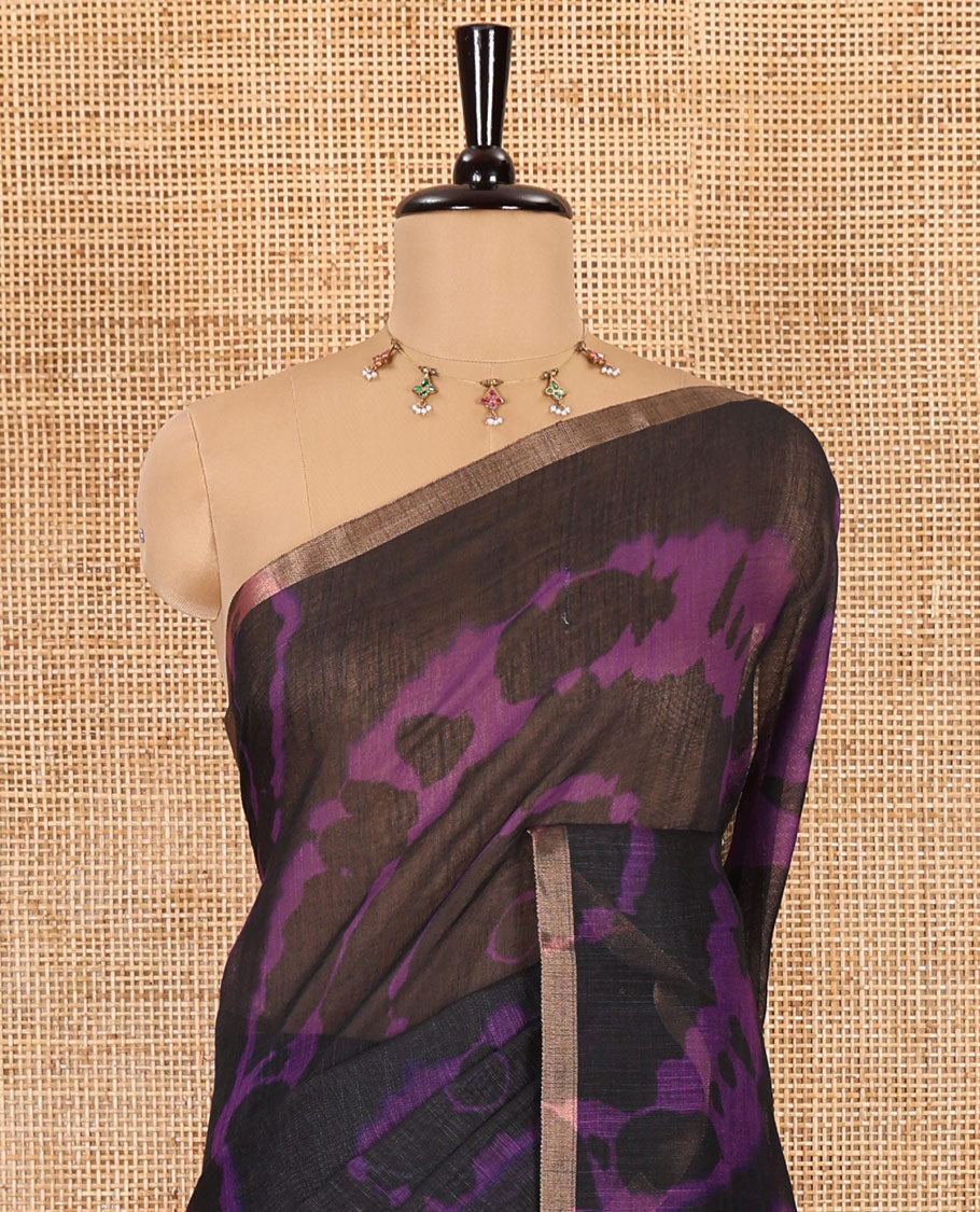 Borderless black big circle shibori printed linen cotton saree, contrast sanganeri floral block printed pallu, and a contrast printed blouse