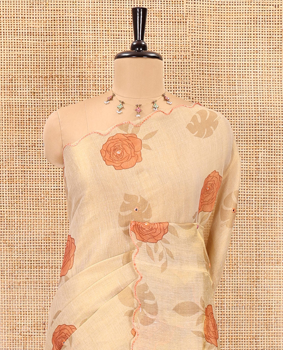 Gold and orange rose motifs printed with mirror work tissue saree, scallop embroidered border, printed pallu, and a contrast blouse