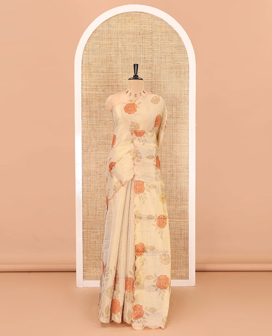 Gold and orange rose motifs printed with mirror work tissue saree, scallop embroidered border, printed pallu, and a contrast blouse