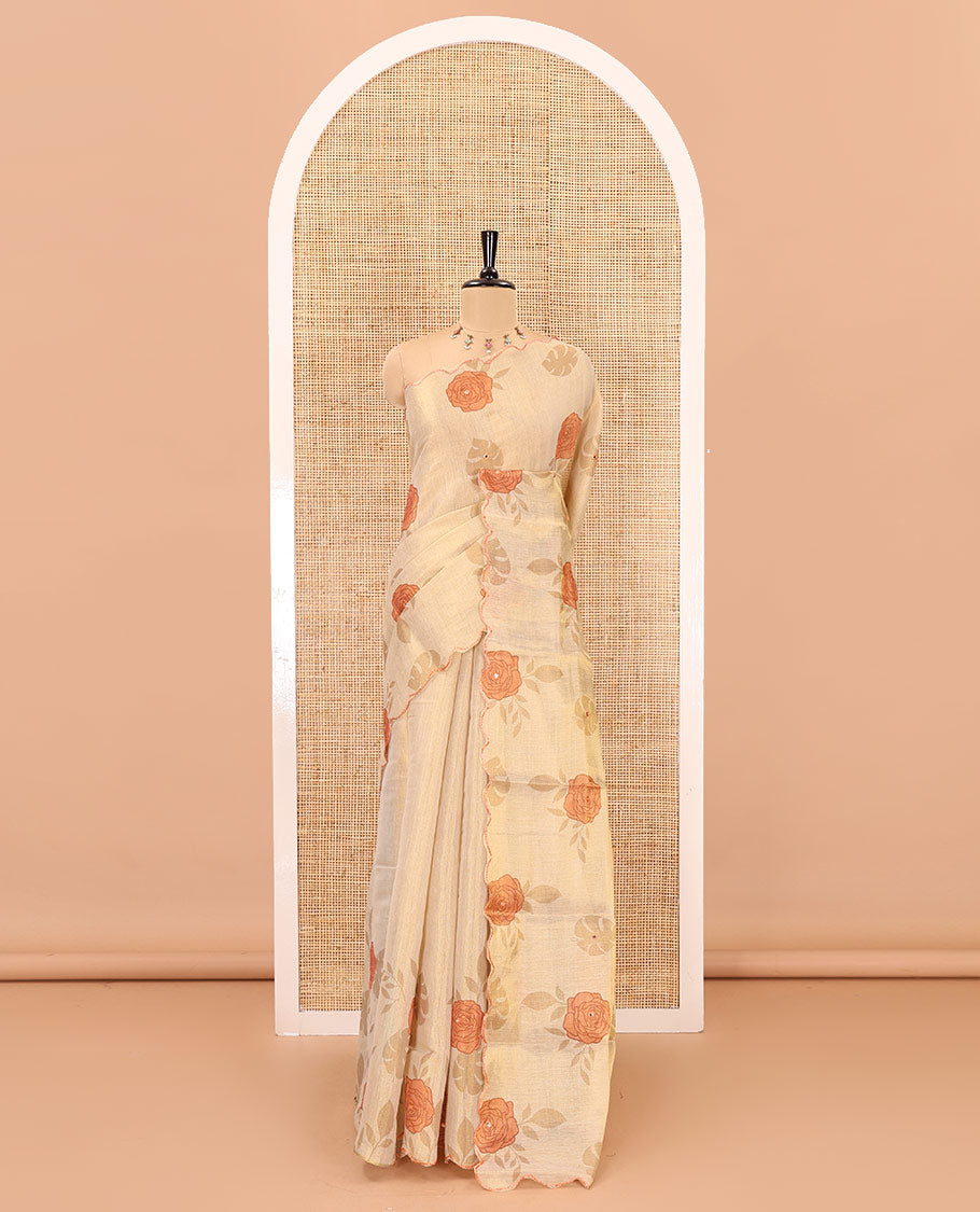 Gold and orange rose motifs printed with mirror work tissue saree, scallop embroidered border, printed pallu, and a contrast blouse