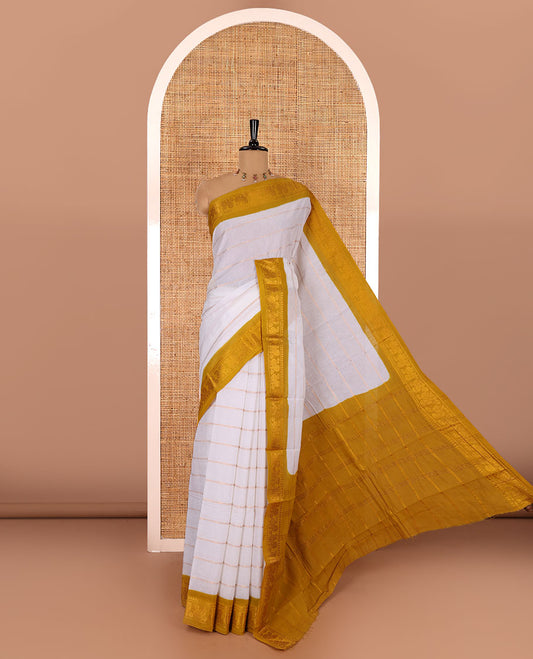 Half-white and yellow Veldhari striped Sungudi cotton saree, contrast traditional border of peacock buttas, zari striped pallu, and a contrast blouse