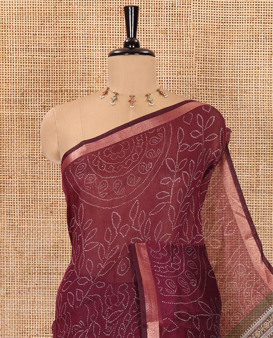 Purple bandhani-style floral and chakra printed saree, zari piping border, contrast ajrakh printed pallu, and contrast ajrakh printed blouse