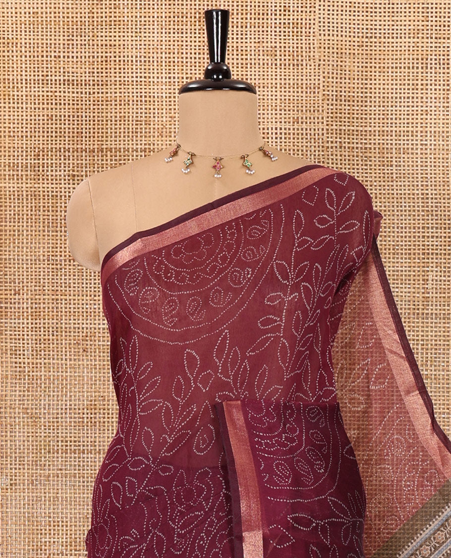 Purple bandhani-style floral and chakra printed saree, zari piping border, contrast ajrakh printed pallu, and contrast ajrakh printed blouse