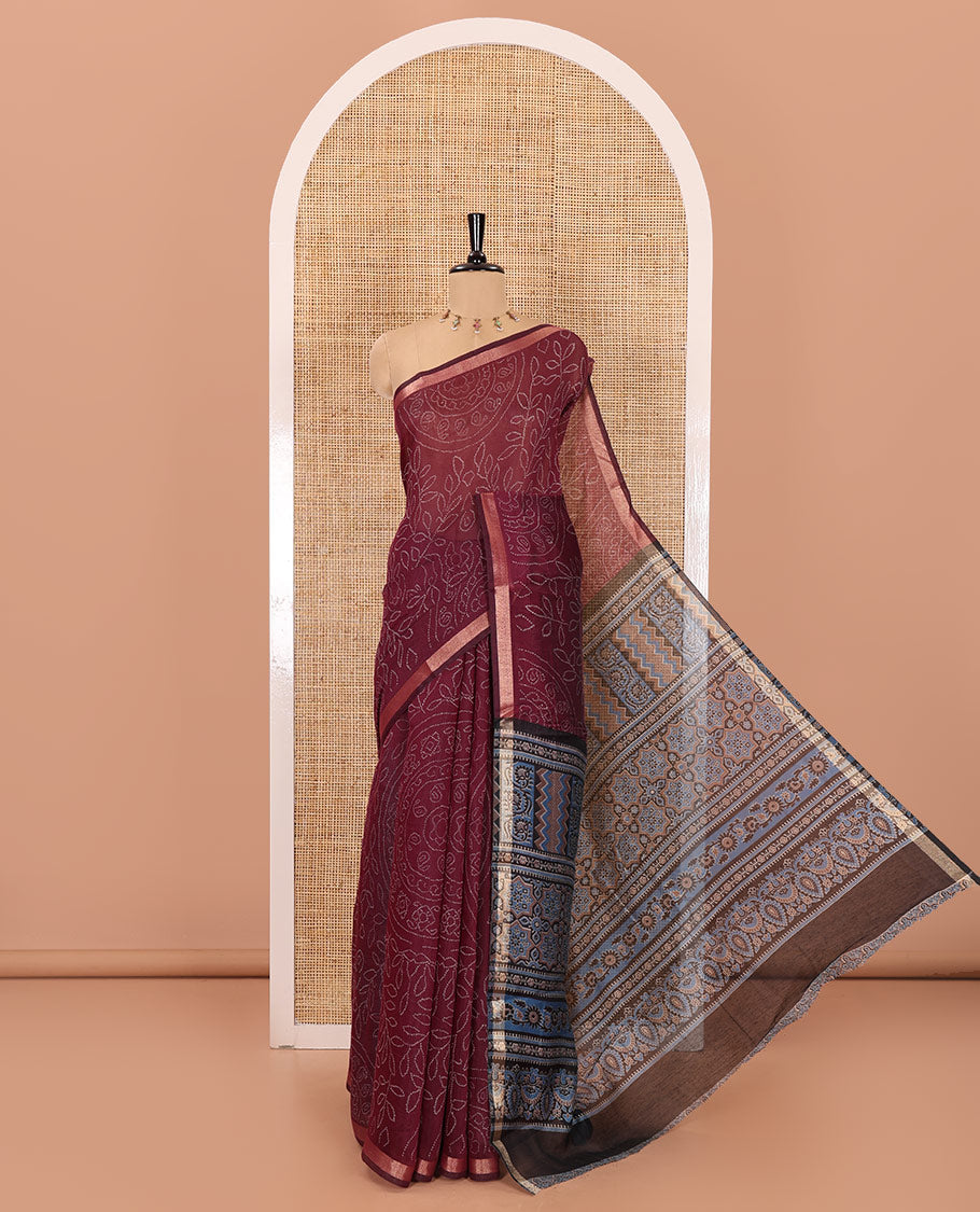 Purple bandhani-style floral and chakra printed saree, zari piping border, contrast ajrakh printed pallu, and contrast ajrakh printed blouse