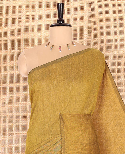 Borderless Mustard Plain Khadi Mul Cotton Saree Featuring a Self Pallu with Tassels, Paired with a Matching Plain Blouse