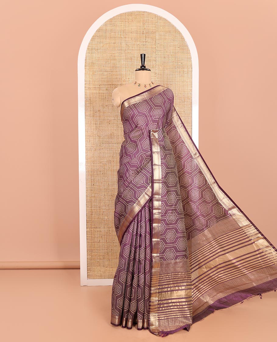 Purple Semi-Tussar Saree Subtly Sparked with Hexagonal Geometric Patterns Printed All Over Its Body, Featuring Traditional Zari Design Border, Gleaming Zari Striped Pallu, and a Matching Blouse