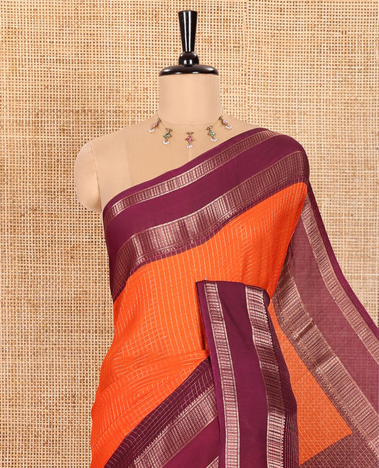 Rust Orange Moss Chiffon Saree Subtly Sparkled with Zari Checks All Over Its Body, Complemented by a Contrast Traditional Zari Design Border, Striped Pallu, and Paired with a Contrast Blouse