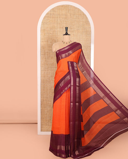 Rust Orange Moss Chiffon Saree Subtly Sparkled with Zari Checks All Over Its Body, Complemented by a Contrast Traditional Zari Design Border, Striped Pallu, and Paired with a Contrast Blouse