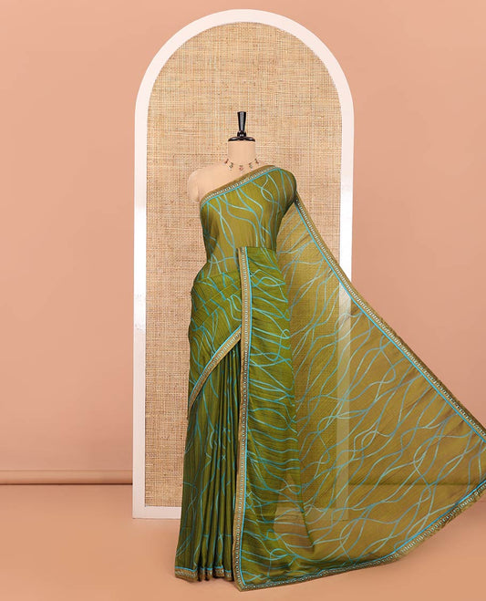 Mehendi Shimmer Chiffon Saree, Elevated with Geometric Patterns on Its Body, Subtle Lace Border, Pallu with the Same Print, and Paired with a Contrast Blouse