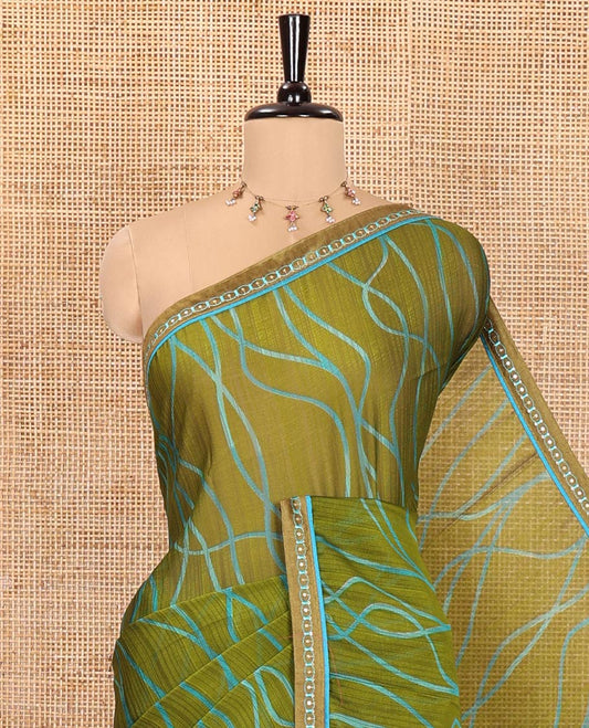 Mehendi Shimmer Chiffon Saree, Elevated with Geometric Patterns on Its Body, Subtle Lace Border, Pallu with the Same Print, and Paired with a Contrast Blouse