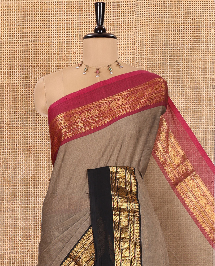 Light Brown Plain Chettinad Cotton Saree, Complemented by a Contrast Kal Erangina Traditional Zari Border of Peacock Designs, Subtly Striped Pallu, and Paired with a Matching Blouse