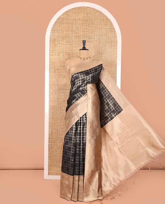 Black Elite Soft Silk Saree, Enthralled with Checked Design on Its Body, Complemented by a Contrast Border of Jungle-Themed Flora-Fauna Motifs, a Pallu of Checked Design, and Paired with a Contrast Blouse