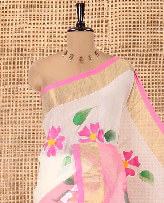 Cream and Pink Khadi Mul Cotton Saree, Adorned with Hand-Brush Painting-Style Floral Block Printed Body, a Subtle Gold Zari Border, a Self-Pallu, and Paired with a Matching Blouse