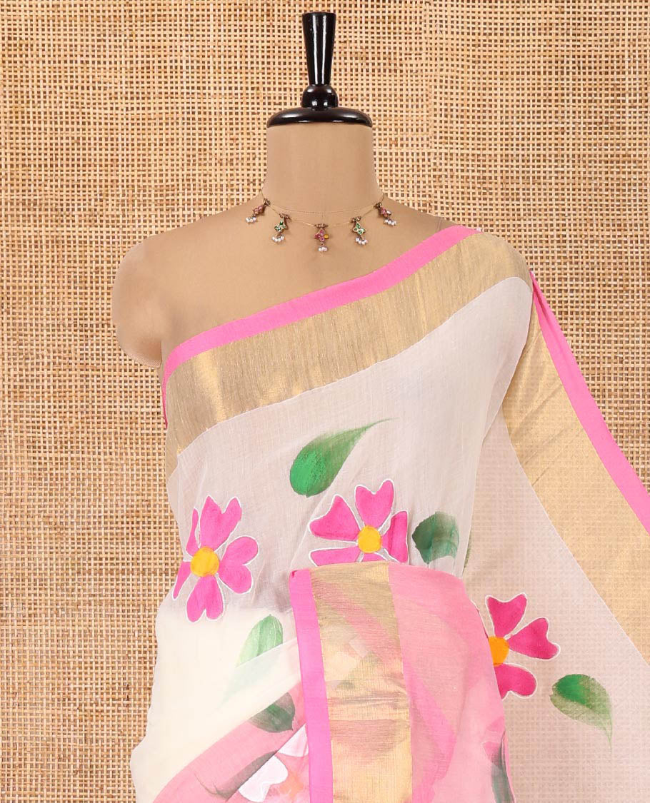 Cream and Pink Khadi Mul Cotton Saree, Adorned with Hand-Brush Painting-Style Floral Block Printed Body, a Subtle Gold Zari Border, a Self-Pallu, and Paired with a Matching Blouse