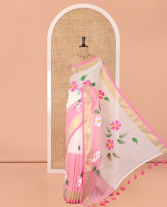 Cream and Pink Khadi Mul Cotton Saree, Adorned with Hand-Brush Painting-Style Floral Block Printed Body, a Subtle Gold Zari Border, a Self-Pallu, and Paired with a Matching Blouse