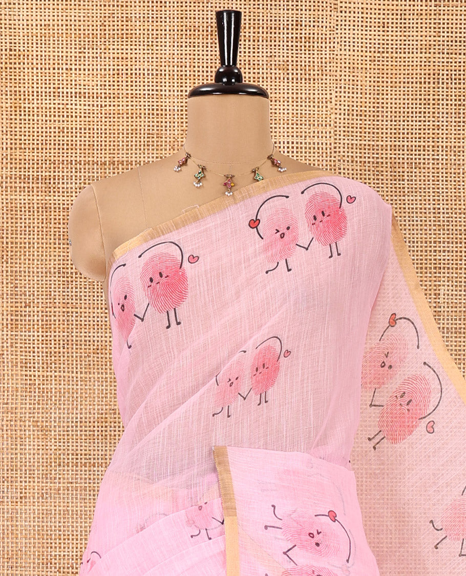 Pink Linen Cotton Saree, Creatively Printed with Thumb Finger Printed Cartoon-Theme Print on Its Body, a Subtle Piping Border, a Self-Printed Pallu, and Paired with a Matching Blouse