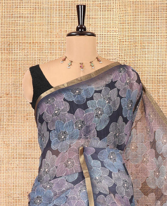Blue Linen Cotton Saree, Steeped in the Prettiness of Flower Motifs Printed on Its Body, a Subtle Piping Border, Pallu Is Meticulously Crafted with Floral Creeper Print, and Paired with a Contrast Blouse