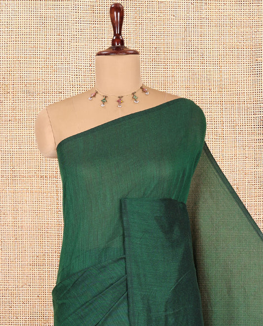 Borderless Green Plain Khadi Cotton Saree, a Self-Pallu with Tassels, and a Matching Blouse