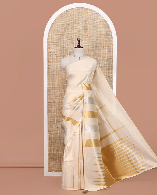 Borderless Gold Tissue Silk Saree, Elevated with Temple Zari Buttas, a Gleaming Zari Temple Pallu, and a Matching Blouse